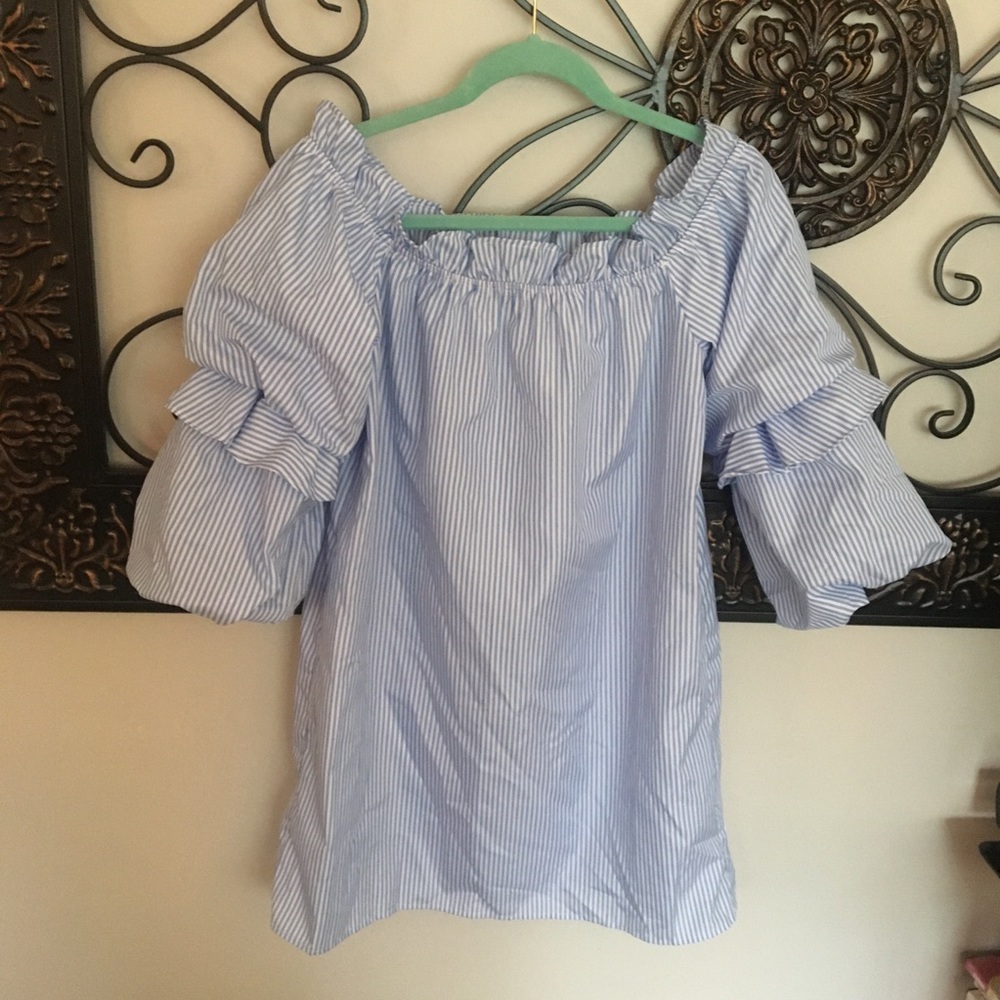 Elastic shoulder draping minidress with vertical stripes.